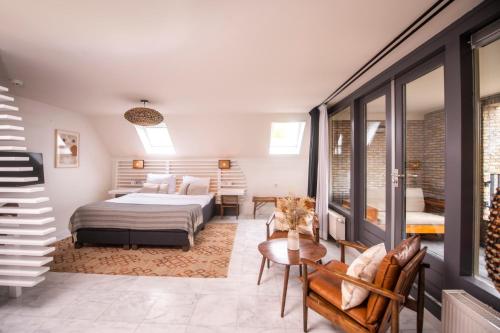 Postel nebo postele na pokoji v ubytování Nobel Hotel Ameland
