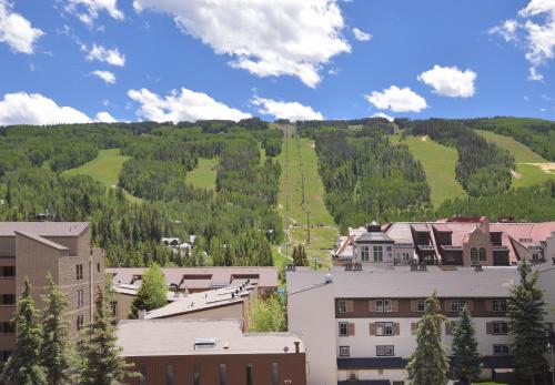 a view of a town with buildings and trees at Vantage Point #408 Condo in Vail