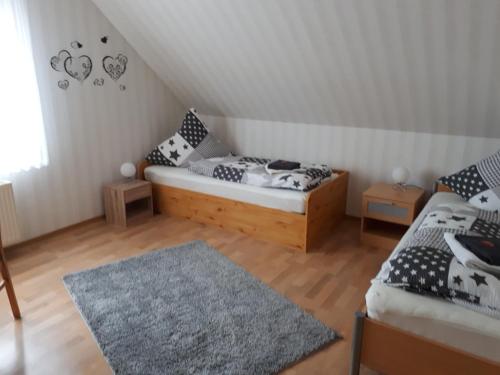 Postel nebo postele na pokoji v ubytování Haus konni