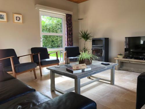 A seating area at Holiday home Gite Saint Donat