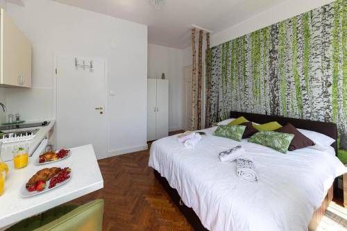 Postel nebo postele na pokoji v ubytování Apartmani Kaiserin