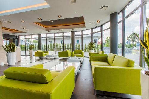 Χώρος καθιστικού στο Hotel Astone Conference & Spa