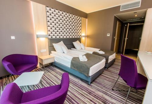 Χώρος καθιστικού στο Hotel Astone Conference & Spa