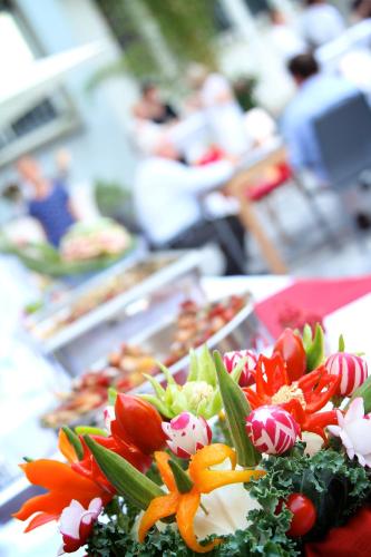 a table with a bunch of different types of food at Hotel Du Parc - Mulhouse Centre in Mulhouse