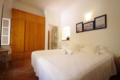 Cama o camas de una habitación en Livingtarifa Apartament La Pita
