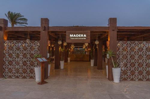 a entrance to a market with a sign that reads maraza at Caesar Bay Resort in Marsa Matruh