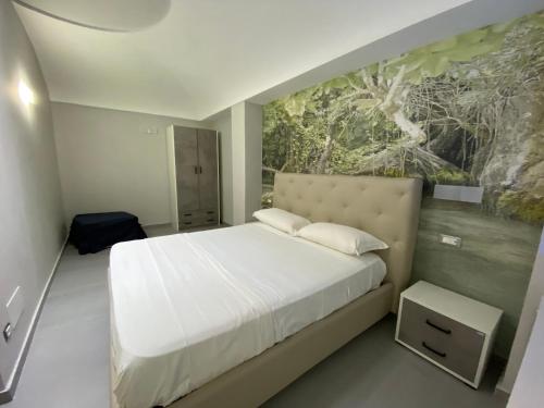 Кровать или кровати в номере Clipper Suite