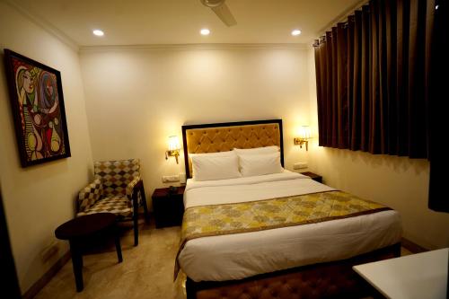 Кровать или кровати в номере Wongdhen House