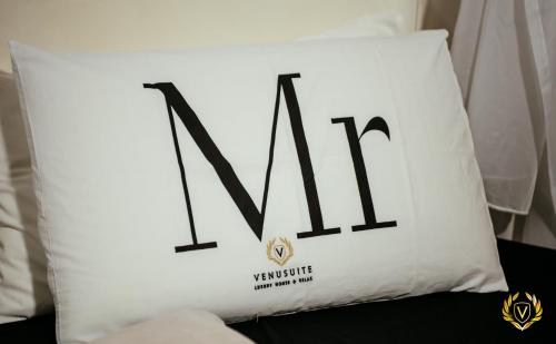 a pillow with the word avalon written on it at VenuSuite VENOSA - Luxury House, Spa & Relax - in Venosa