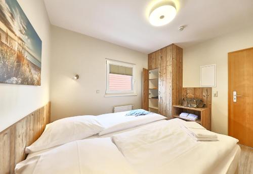 Postel nebo postele na pokoji v ubytování Pamir - 29