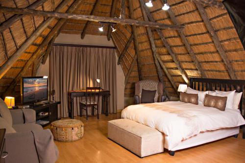 מיטה או מיטות בחדר ב-Edison Luxe Guest House