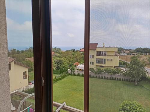 a view from a window of a yard at Hotel Vanilla, Varna - Free parking in Varna City