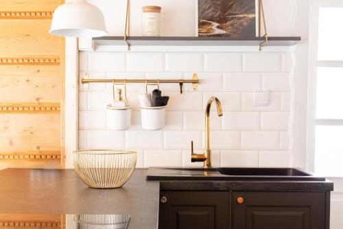 Kuchyňa alebo kuchynka v ubytovaní Apartamenty Polana Pająkówka