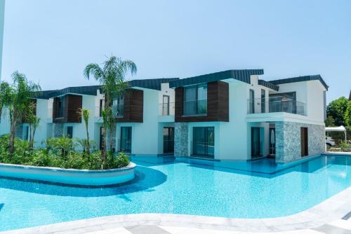 an image of a villa with a swimming pool at Liberty Fabay - Ultra All Inclusive in Fethiye