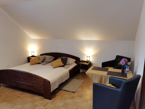 Postel nebo postele na pokoji v ubytování ATMOSPHERE Apartments