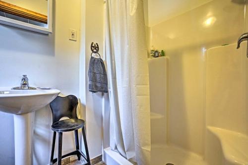 a bathroom with a sink and a shower and a toilet at High Lakes Hideaway La Pine Fishing Cabin! in La Pine