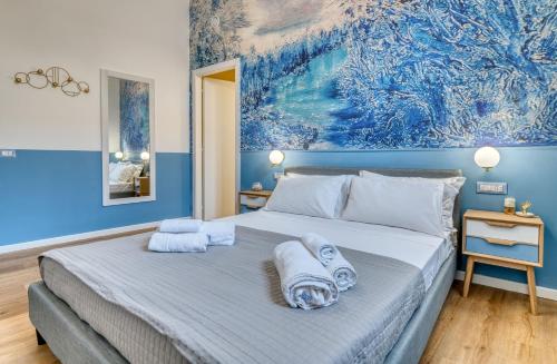 Postel nebo postele na pokoji v ubytování IzzHome Corso76