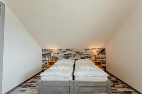 Posteľ alebo postele v izbe v ubytovaní Chaty Panoráma