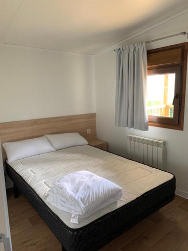 Voodi või voodid majutusasutuse Panticosa Lodge toas