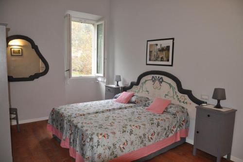 Ένα ή περισσότερα κρεβάτια σε δωμάτιο στο Chez Rovere