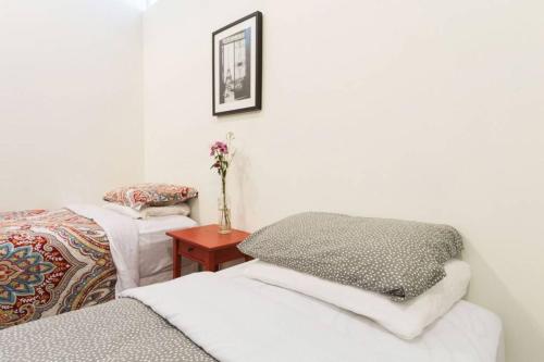 Ένα ή περισσότερα κρεβάτια σε δωμάτιο στο Union Square - Four Bedroom Condo-Hotel Suite