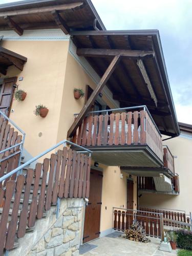 an external view of a house with a balcony at Ca’ Alba in Sestola