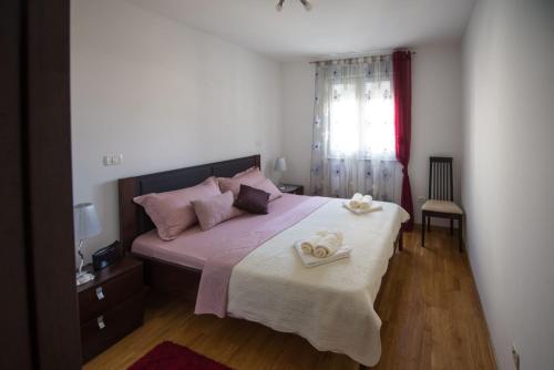Postel nebo postele na pokoji v ubytování Lidija