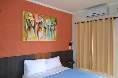 Postel nebo postele na pokoji v ubytování Hotel Poloni