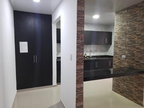 Dapur atau dapur kecil di Balcones de la Rivera Apartamento Azulejo 3