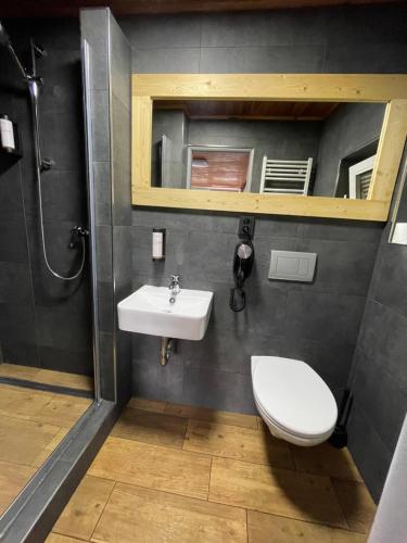 Vonios kambarys apgyvendinimo įstaigoje Apartments Maxi