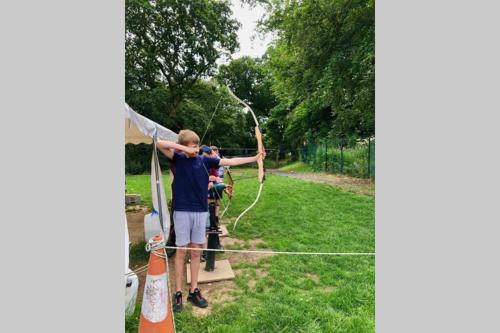 two people are playing with a bow and arrow at Glenmount Castleblayney in Castleblayney