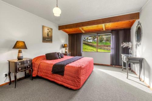 A bed or beds in a room at Chartré Manor B&B