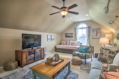 a living room with a couch and a tv at 5 Mi to Bethany Beach Chic Home with Grill! in Ocean View