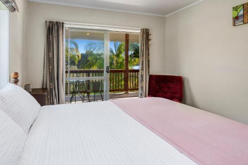 Posteľ alebo postele v izbe v ubytovaní Ota Point Paradise - Whangaroa Holiday Home