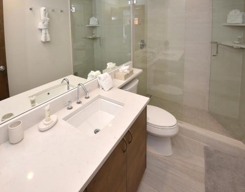 a bathroom with a sink and a toilet and a shower at Lionshead Centre #307 Condo in Vail