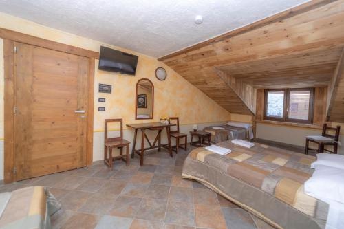 Postel nebo postele na pokoji v ubytování Hotel Gran Trun