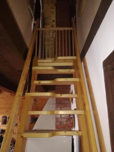 a staircase in a house being constructed with wood at Hugo's House in Rakitna