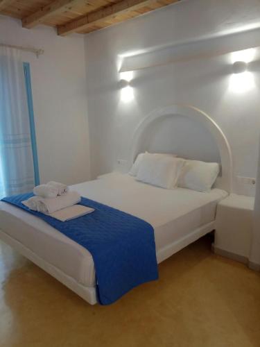 Ένα ή περισσότερα κρεβάτια σε δωμάτιο στο Asterias studios koufonisi