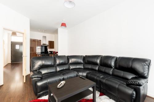 O zonă de relaxare la Beautiful Apartments with Free Secure Parking and Wifi in the Heart of JQ