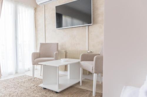 A klub apartmaniにあるテレビまたはエンターテインメントセンター
