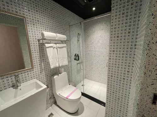 Koupelna v ubytování Weifeng Boutique Business Hotel - Zhanqian Branch
