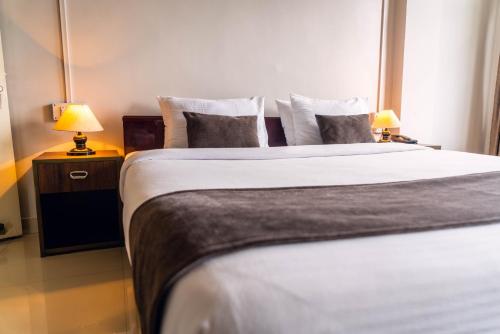 Cama o camas de una habitación en Hotel Ariel
