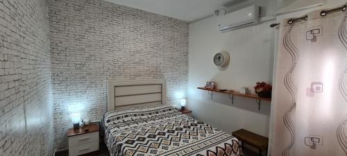 Habitación San Cayetano tesisinde bir odada yatak veya yataklar