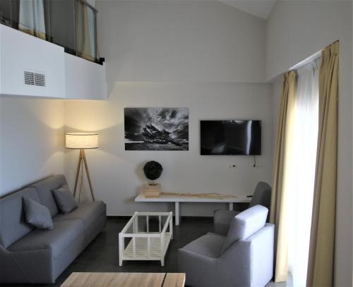 TV a/nebo společenská místnost v ubytování Hotel Bonalba Alicante
