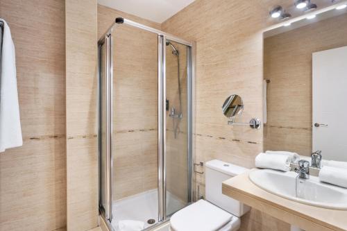 Ванна кімната в Apartamentos Metrópolis