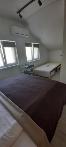 Ένα ή περισσότερα κρεβάτια σε δωμάτιο στο Villa SOFI