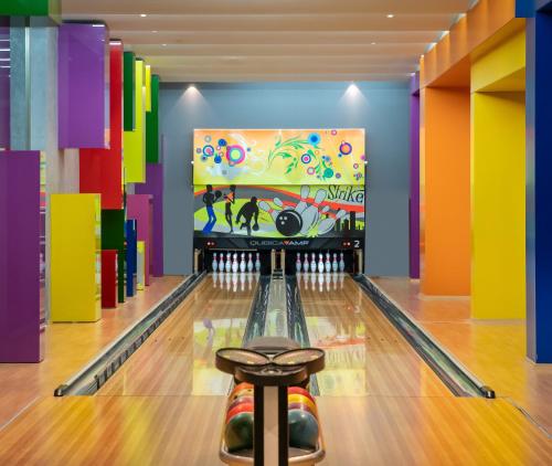 an alley with a bowling alley at Elexus Hotel Resort & Spa & Casino in Kérynia