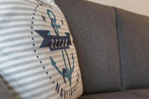 a tie with a star on it in a box at Ferienwohnung Ausblick in Bremerhaven