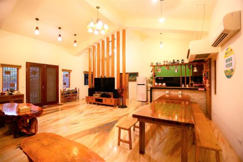 TV a/nebo společenská místnost v ubytování 鄉間雅築休閒民宿Country Villa Homestay