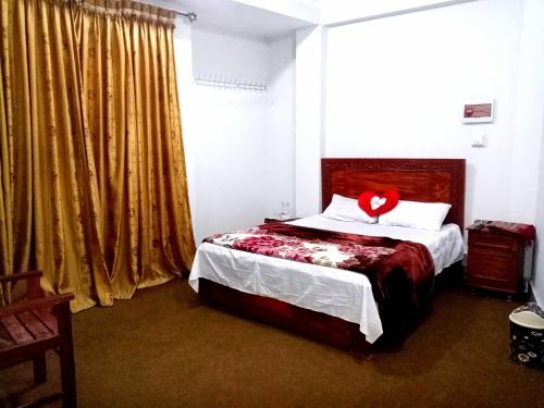Ліжко або ліжка в номері Hotel Tour De Swat